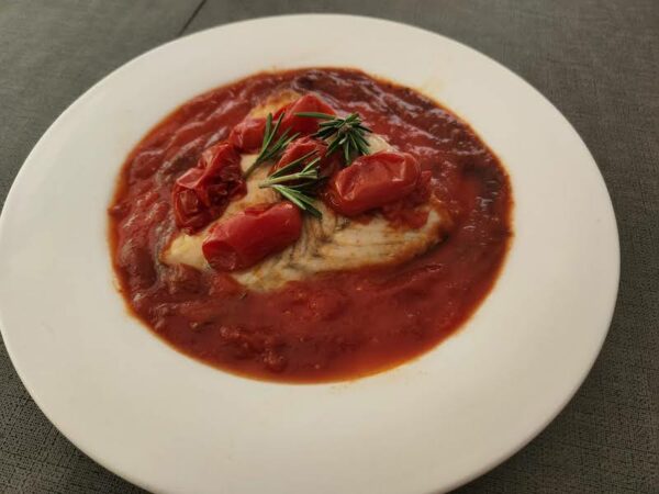 broiled sea bass w corbarino tomatoes and rosemary